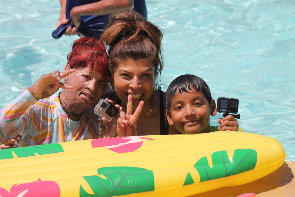 Woman and kids in pool